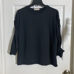 Anthropology pebble and s black blouse